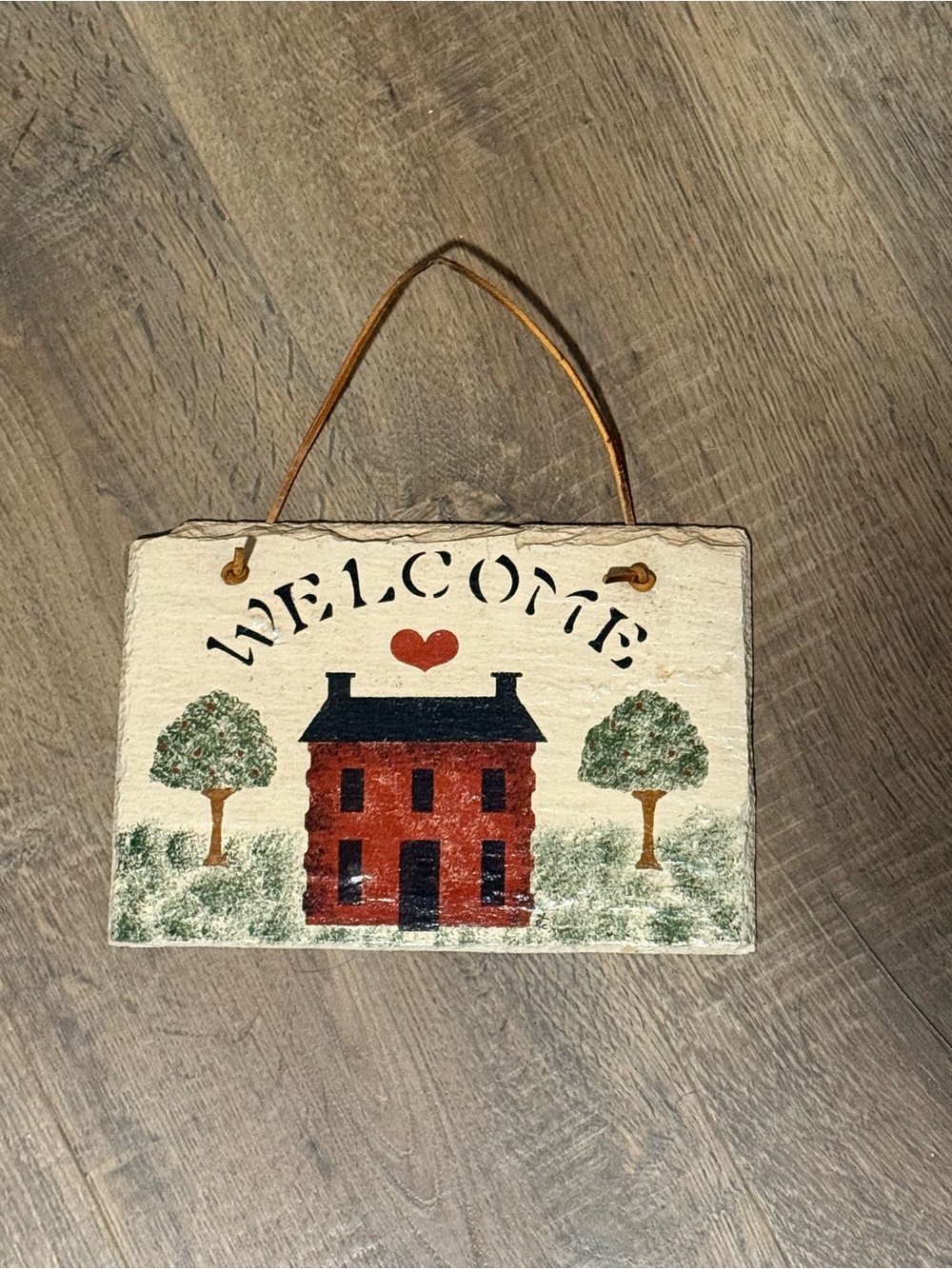 Folk Art Welcome Sign - painted on a stone slab